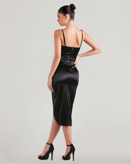 The Margaret Formal Satin Wrap Midi Dress helps create a chic women's black cocktail outfit with a trendy texture and stylish design, ideal for wedding guest cocktail outfits or dinner parties
