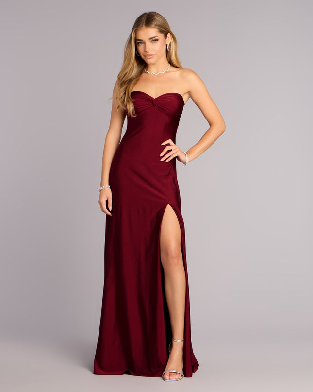 This wine prom dress, the Madeline Strapless Tie-Back A-Line Dress , features a sleek, floor-length design with trend-forward details that capture the excitement of Prom 2026.