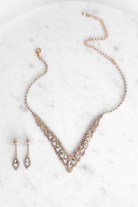 Get inspired with the Elegant Tear Drop Rhinestone Set, a feed-worthy gold piece that’s part of Windsor's updated and curated women’s clothing edit packed with must-have fall outfit ideas.