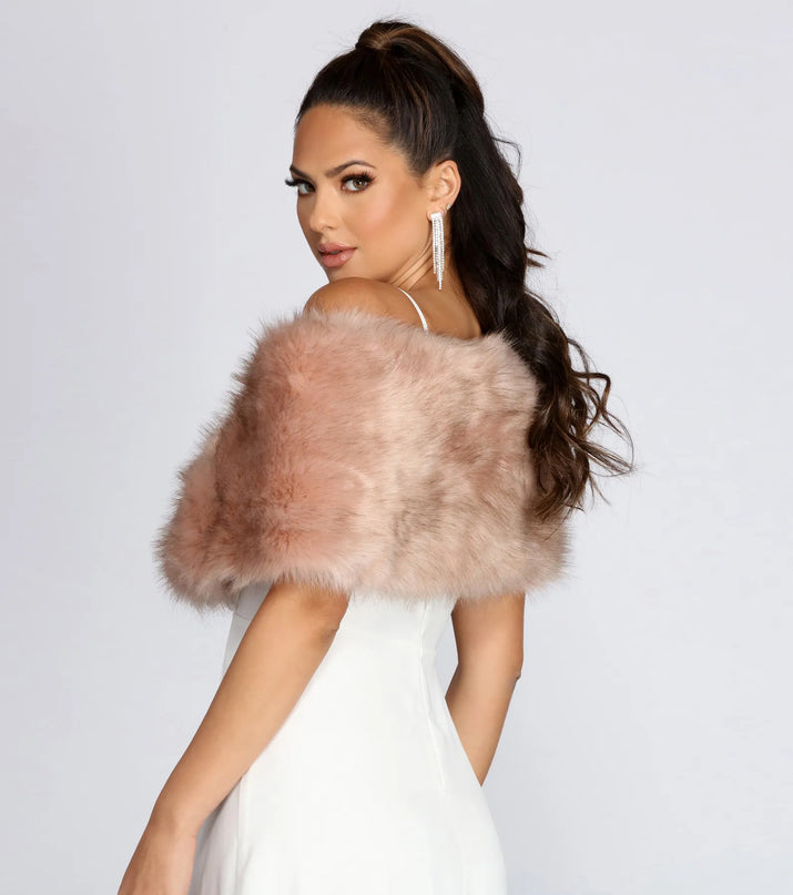 Get ready for any event with the Ms. Diva Faux Fur Shawl in mauve, an essential start to creating a versatile outfit for nightime parties, cocktail hours, or outdoor events.
